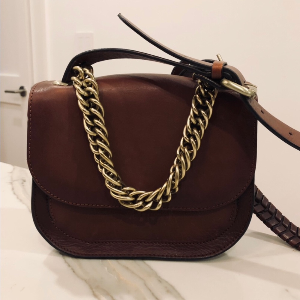 Leather cross body bag with chain